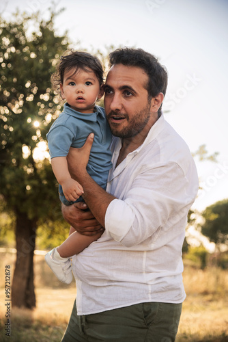  Father Holding Son on Father's Day