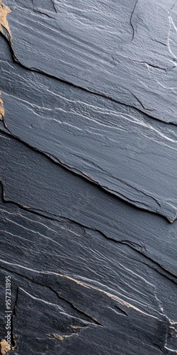 Dark metallic surface with a brushed finish, background, industrial copy space is perfect for showcasing sleek and modern designs.