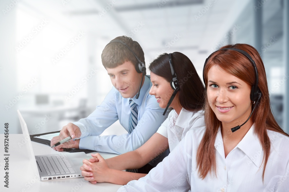 Business people at work in call center and telemarketing Business people at work in call center and telemarketing