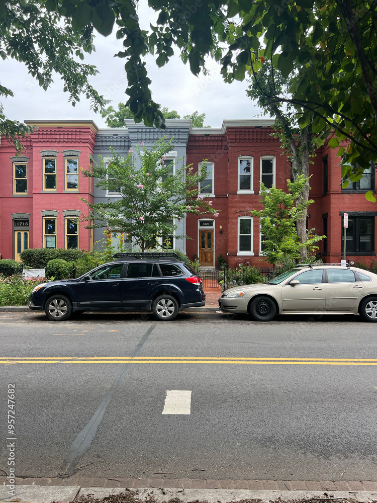 car in front of a house on a street in old town car in front of a house on a street in old town