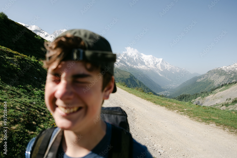 silly portrait of teen, during a Tour du Mont Blanc hike silly portrait of teen, during a Tour du Mont Blanc hike
