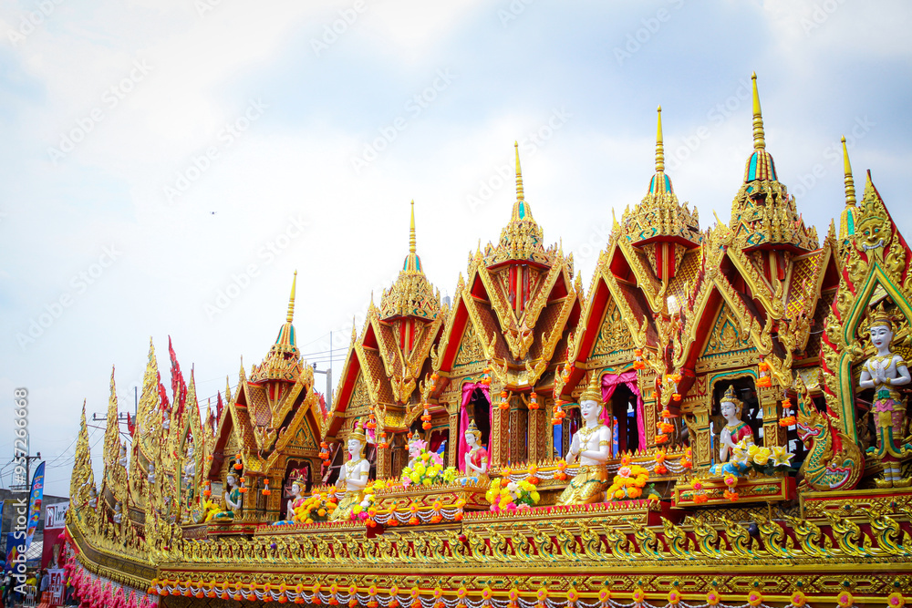 Fototapeta premium Yasothon Province, Thailand -11 May 2024 : Yasothon Rocket Festival The procession is decorated as a ritual to ask for rain to the angels to get water for agriculture. according to local beliefs
