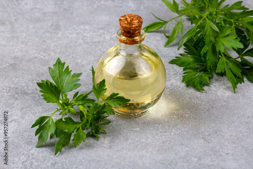 Parsley essential oil in a ...