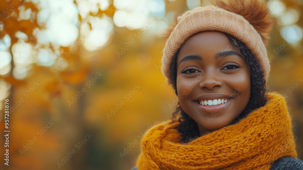 Portrait of young happy smiling black girl in autumn park, positive cheerful young woman enjoying a walk outdoors in autumn forest. Active lifestyle, good health. Enjoying outdoors. Portrait of young happy smiling black girl in autumn park, positive cheerful young woman enjoying a walk outdoors in autumn forest. Active lifestyle, good health. Enjoying outdoors.