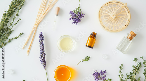 Various essential oils in amber bottles are placed alongside fresh lavender flowers, creating a serene and aromatic setting ideal for relaxation and wellness