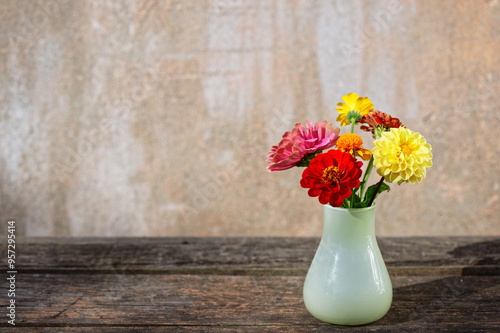 Wallpaper Mural Bouquet of flowers in a glass vase on an old wooden table Torontodigital.ca