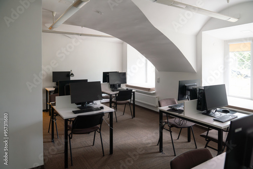 Workspace with computers on desks. photo