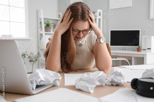 Stressed young businesswoma...