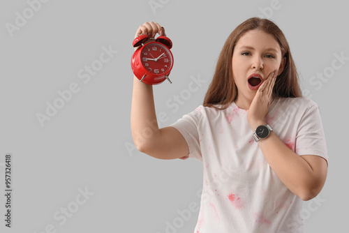 Surprised young woman with ...