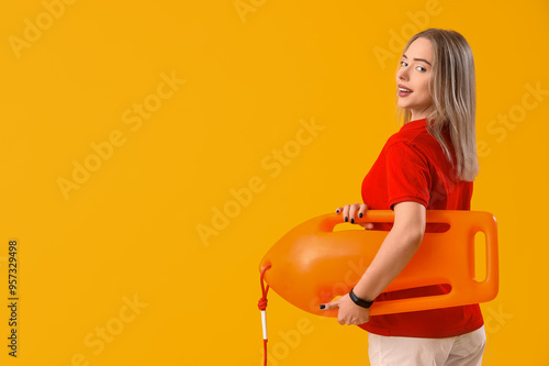 Female lifeguard with rescu...