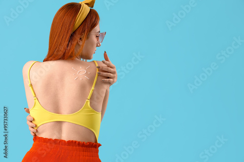 Young woman with sun made o...