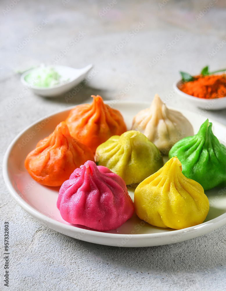 Colorful Ukadiche Modak sweet rice dumplings. Traditional Indian food. Ganesh Chaturthi Festival. Colorful Ukadiche Modak sweet rice dumplings. Traditional Indian food. Ganesh Chaturthi Festival.