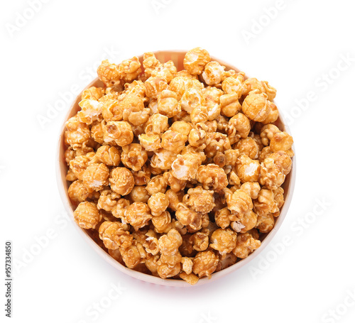 Bucket of tasty caramel popcorn isolated on white background