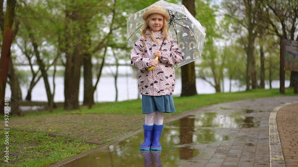 A delightful young girl stands with her bright umbrella, embracing the joy of a rainy day in the park A delightful young girl stands with her bright umbrella, embracing the joy of a rainy day in the park