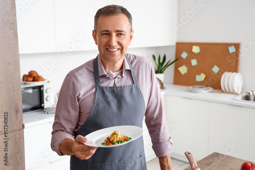 Mature man with fried veget...