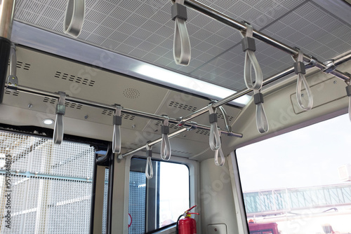 View of public transport bus with handholds and handrails and handgrip