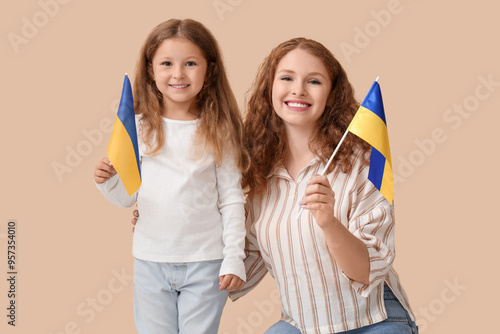 Happy little girl and her m...