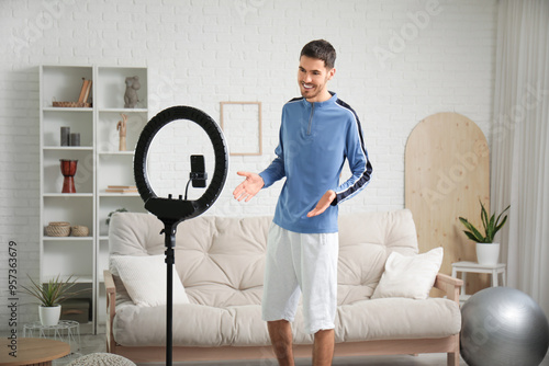 Sporty happy male blogger r...