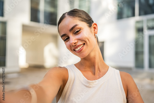 Free Download Self portrait of beautiful smile young woman stand in front building - GFXLoad