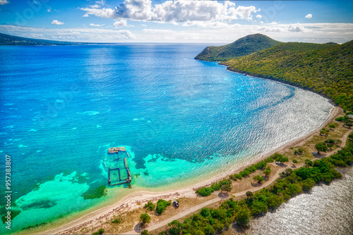Aerial Drone photos of a sunken shipwreck off the coaast of St. Kitts in clear, tropical water