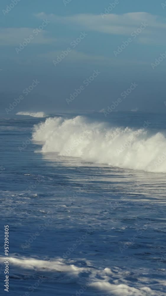 Beautiful slow motion slo mo ocean waves crashing and breaking off the sea shore in Hawaii suggests power, magnificence, spray, freshness, storm. Beautiful slow motion slo mo ocean waves crashing and breaking off the sea shore in Hawaii suggests power, magnificence, spray, freshness, storm.