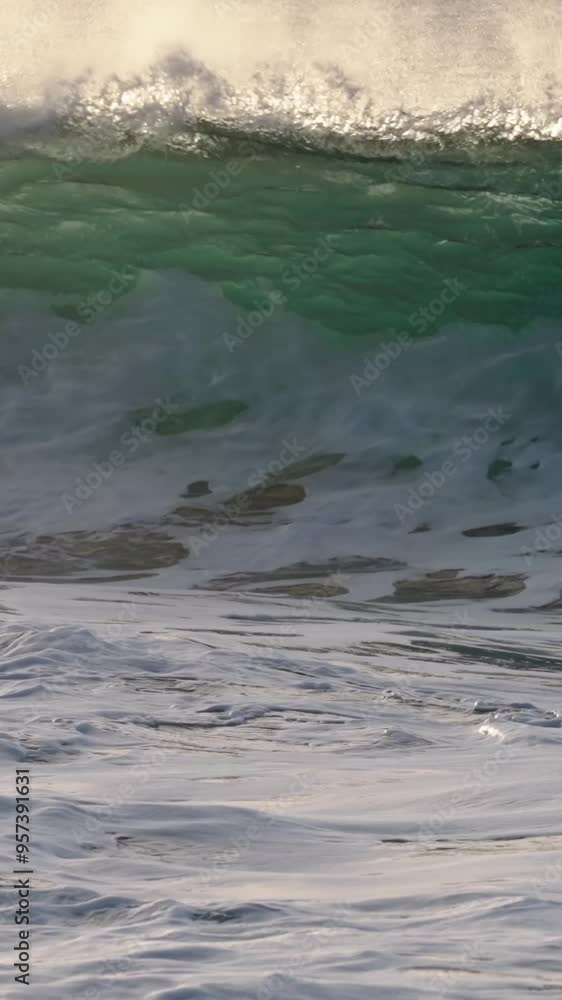Beautiful slow motion slo mo ocean waves crashing and breaking off the sea shore in Hawaii suggests power, magnificence, spray, freshness, storm. Beautiful slow motion slo mo ocean waves crashing and breaking off the sea shore in Hawaii suggests power, magnificence, spray, freshness, storm.