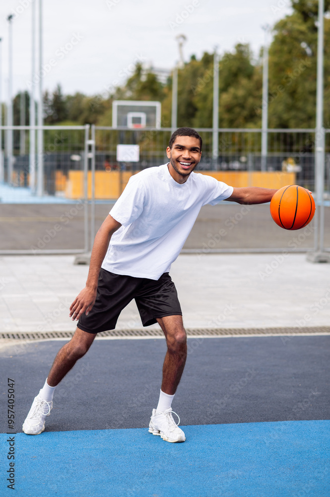 Fototapeta premium Man with a ball making movements while his workout