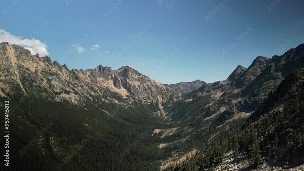 Aerial looking down valley in North Cascade mountains on Washington Pass in summer Aerial looking down valley in North Cascade mountains on Washington Pass in summer