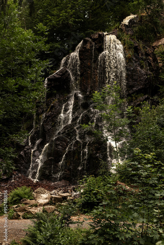 Mountain waterfall. Waterfall in the mountains in summer. Rocks