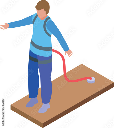 Young man is preparing to jump from a wooden platform, secured with safety belts for a thrilling bungee jumping experience