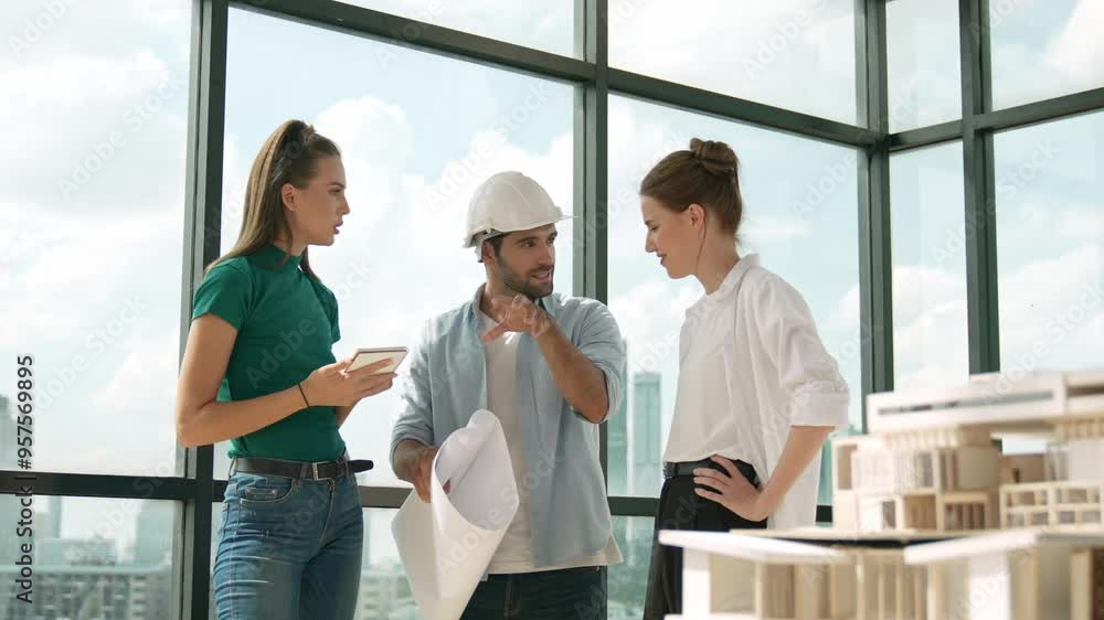 Skilled architect team discuss about project while taking a note. Engineer sharing, brainstorming, thinking about building construction at skyscraper, city view while stand near window. Tracery Skilled architect team discuss about project while taking a note. Engineer sharing, brainstorming, thinking about building construction at skyscraper, city view while stand near window. Tracery