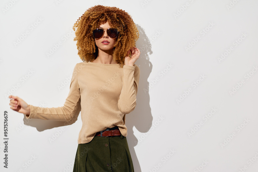 Εκτύπωση καμβά Fashion model with curly hair wearing sunglasses, beige top and green skirt, aga