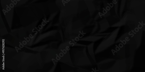 Crumpled texture of dark black wrinkle chaotic paper. close up canvas old crumple black paper sheet abstract shape background space for text.	
