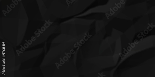 Crumpled texture of dark black wrinkle chaotic paper. close up canvas old crumple black paper sheet abstract shape background space for text.	
