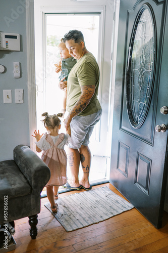 happy lgbtq family getting ready to leave their house photo