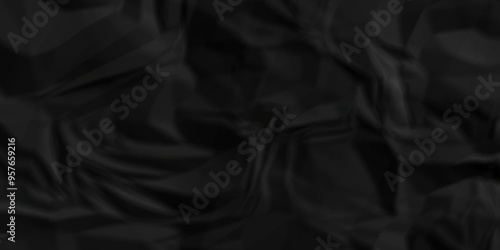 Crumpled texture of dark black wrinkle chaotic paper. old crumple black paper sheet abstract shape background space for text. 