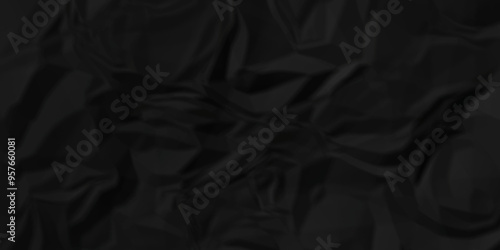 Crumpled texture of dark black wrinkle chaotic paper. close up canvas old crumple black paper sheet abstract shape background space for texture.	
