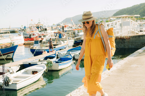Tourist walking in a harbor in Portugal