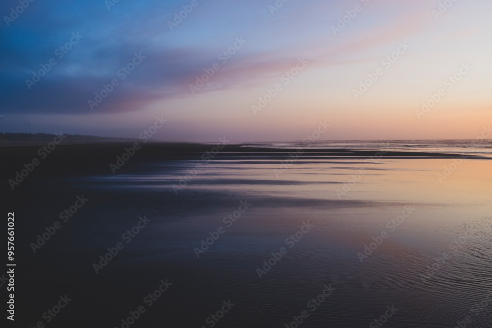 Dramatic sky over vast beach and coast Dramatic sky over vast beach and coast