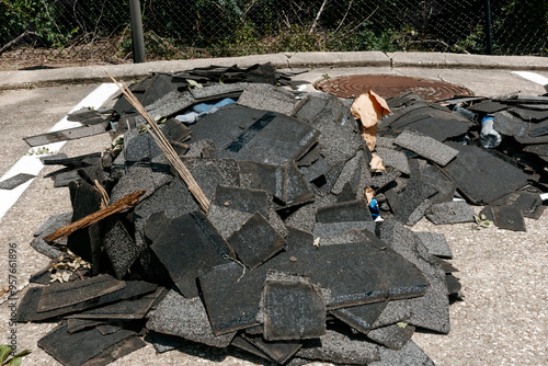 Stacked Roof Shingles After Hurricane Winds photo