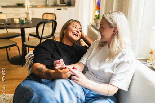LGBT Couple Enjoying Nail Painting Session at Home
