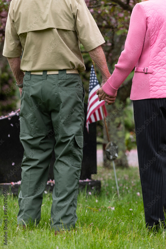 Senior military War Veteran holding wife hand standing Senior military War Veteran holding wife hand standing