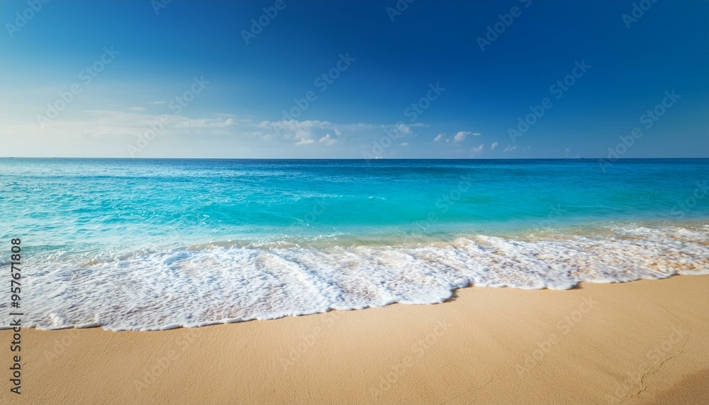 Soft blue ocean wave on clean sandy beach, landscape background Soft blue ocean wave on clean sandy beach, landscape background