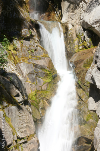 Christine falls surges through a narrow canyon