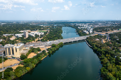 Aerial photo of the I-35 highway passing over Lady Bird Lake in Austin, Texas