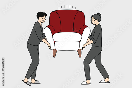 An illustration of two people lifting a red armchair together, demonstrating teamwork and cooperation in a domestic setting, ideal for concepts related to home moving or interior design photo