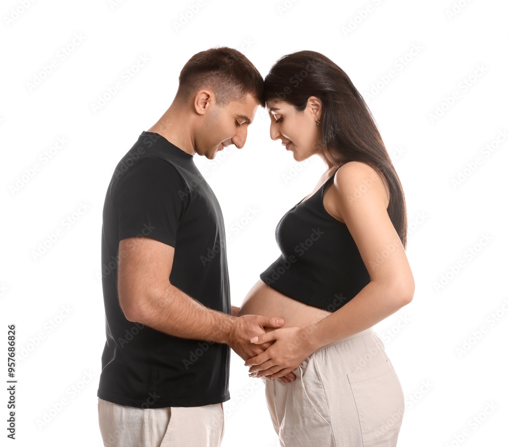 Beautiful pregnant woman with her husband isolated on white Beautiful pregnant woman with her husband isolated on white