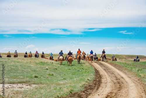 Group of horse riders on cattle drive