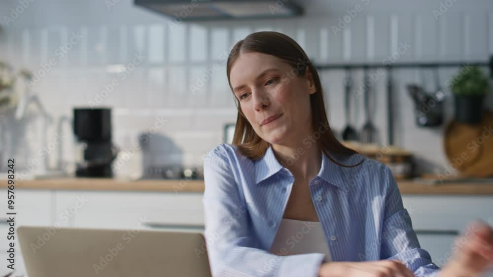 Online student talking video call laptop at modern kitchen interior closeup. Online student talking video call laptop at modern kitchen interior closeup.