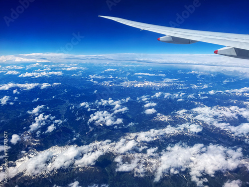 Aerial View of German Alps with Plane Wing